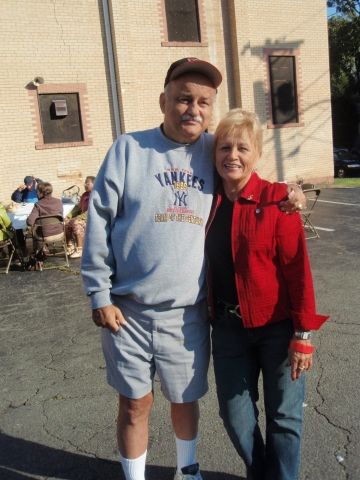 Bruce Henderson and Kathleen 
Messaros (tailgate party)