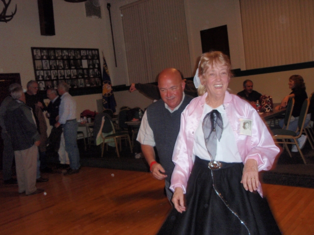 Ruth and Joe dancing at tailgate
party
